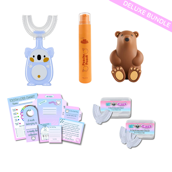 Children's dental care bundle with KOALA-shaped toothbrush, peach-flavoured toothpaste, bear-shaped toothbrush holder, and educational materials on a white background designed for children with ASD.