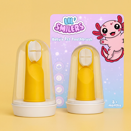 A baby's 1st Toothbrush in yellow. It is a finger brush designed for the parent to put on their finger to brush the baby's teeth.